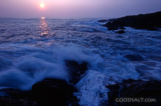 Waves Over the Rocks at Sunset