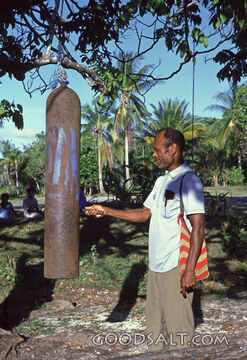 Man Ringing Bell for Church