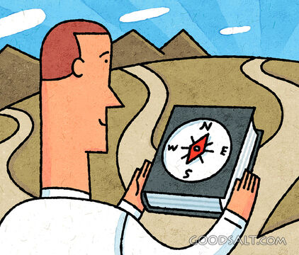 Man Using Bible As Compass