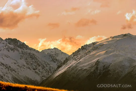 Last Light on Snow-Crowned Mountains