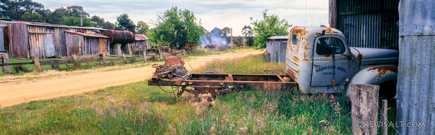 Old Dodge tray truck cabin and bare rear frame.