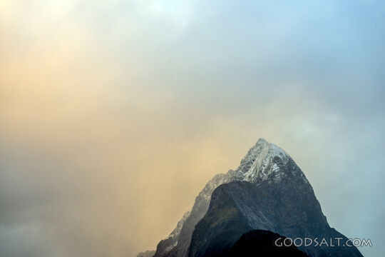 Prominent alpine peak with cloud effects.