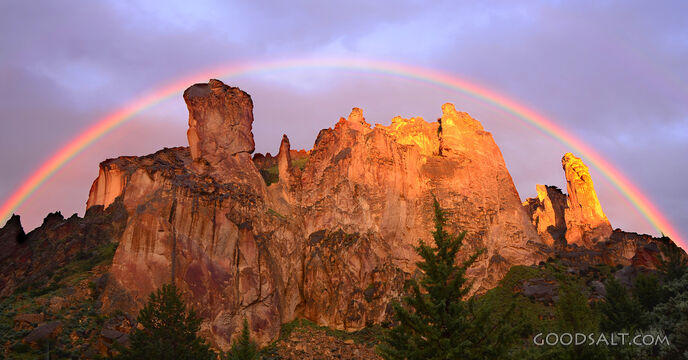 Rainbow over Rocky Cliff