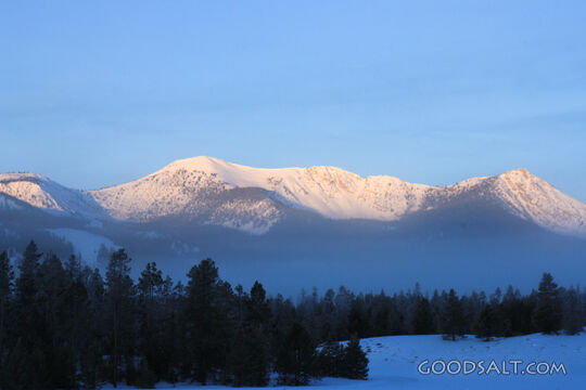 Snow Covered Hills at Sunset