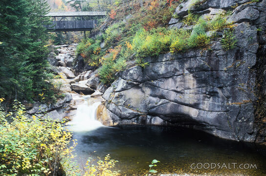 Stream With Bridge and Rocky Outcropping