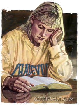 A young woman reading the bible.