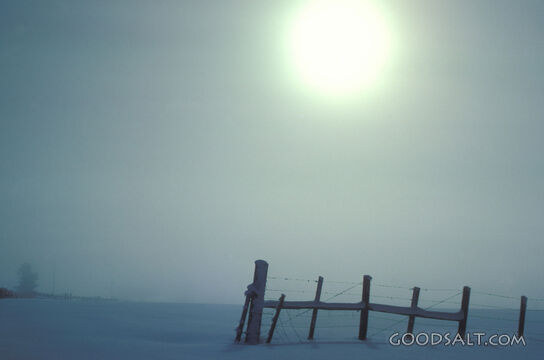 Winter Fence Under the Hazy Sun