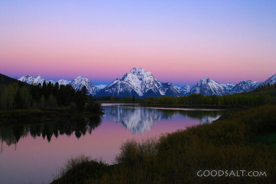 Tetons and reflection of sunrise on Snake River at Oxbow Ben