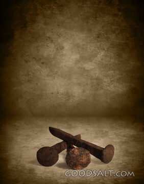 Three Nails on Grunge Background