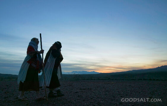 Two Isrealite Men in Silhouette Walking - One With Staff in