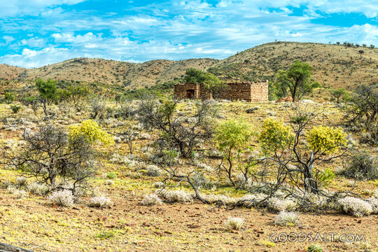 wild dry outback scrub, with remnants of pioneeing farming