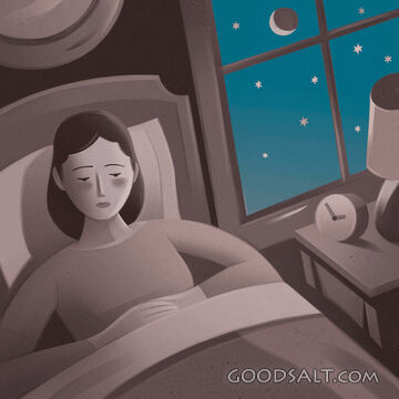 Woman Awake in Bed