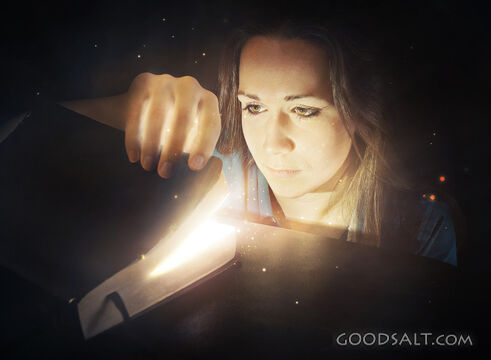 Woman Looking Into Bible