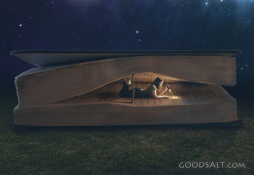 Woman Reading Inside a Large Bible