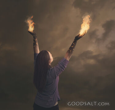 Woman With Hands on Fire