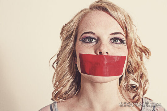 Woman With Red Tape