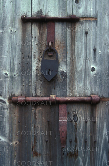 Locked Wooden Door with Iron Bolt