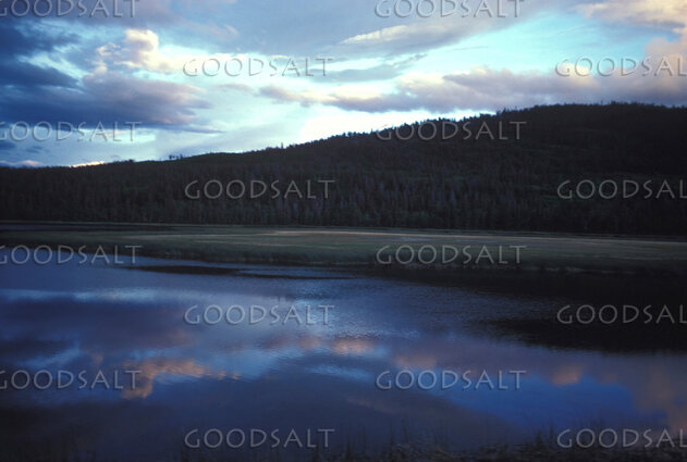 Still Waters Beneath the Evening Sky
