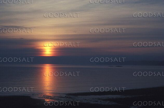 Sunset Reflection Over Quiet Waters