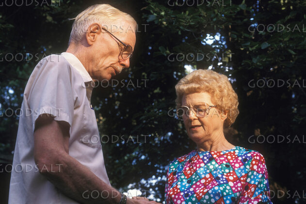 Elderly Couple in Outdoor Prayer