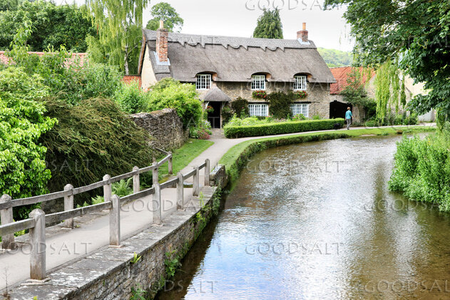 Thatched Cottage by the Village Stream