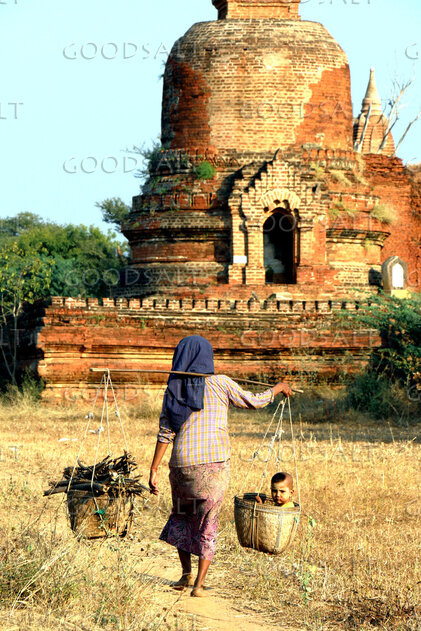 Mother Passing the Ancient Brick Temple