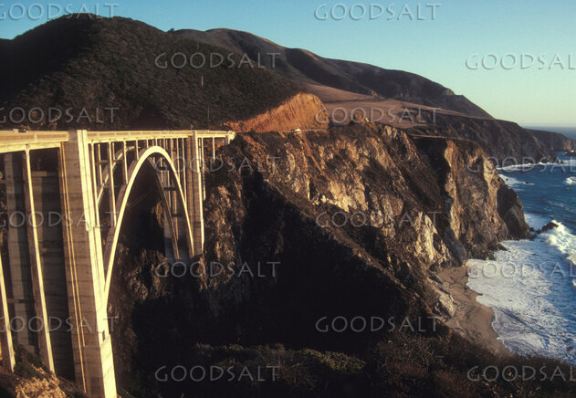 Coastal Bridge Over Rocky Shore