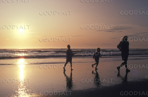 Family Walk at Sunset Shore
