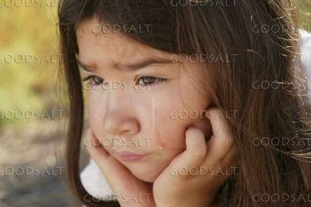 Thoughtful Child in Quiet Reflection