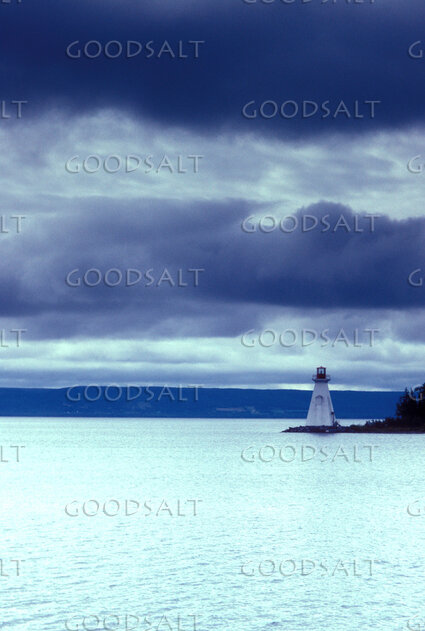 Lighthouse Beacon Over Troubled Waters
