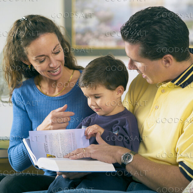 Parents Teaching Their Son Scripture