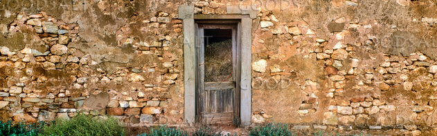 crumbling door in disused heritage building