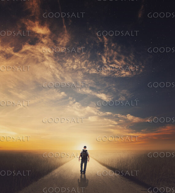 Man Walking Down Pathway