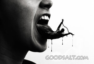 A Persons Tongue Filled With Black