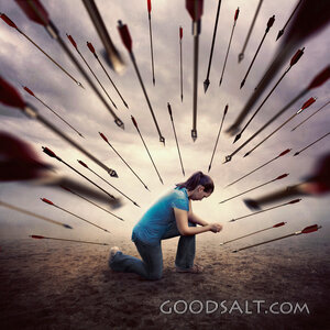 A woman praying during an attack