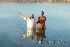 African Man Prays Before Baptism