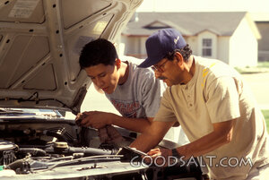 Father Teaching Son Auto Repair