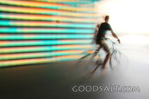 Blurred Bicycle Rider