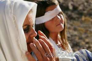 Mother Praying Over Her Wounded Daughter