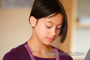 Close-up of Asian girl meditating.