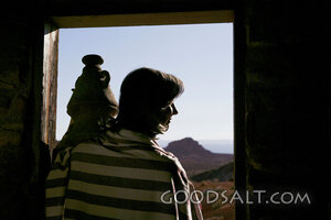Woman with Clay Jar at the Doorway