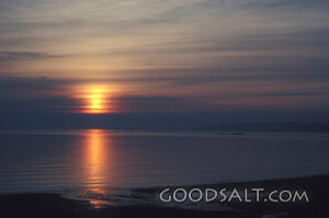 Sunset Reflection Over Quiet Waters