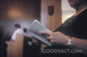 Holding the Holy Bible in Worship