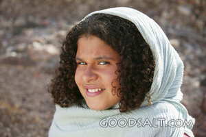 Smiling Child in Biblical Garments