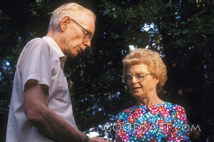 Elderly Couple in Outdoor Prayer