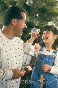 Father and Daughter at the Christmas Tree