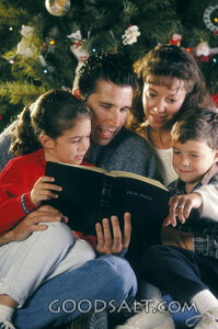 Family Reading the Holy Bible at Christmas