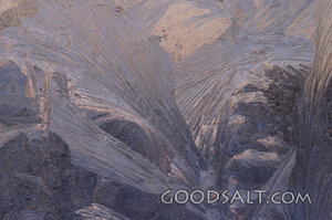 blue hoar frost on glass