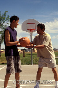 Father Teaching Son Basketball