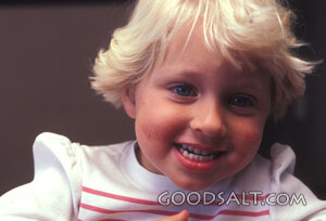 Smiling Child with Messy Face
